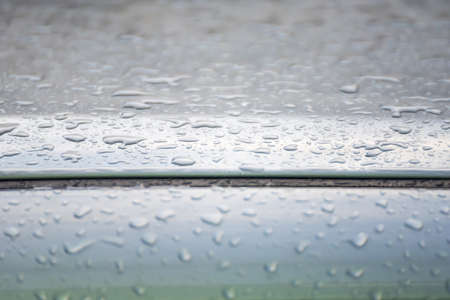 Raindrops on the roof of the carの写真素材