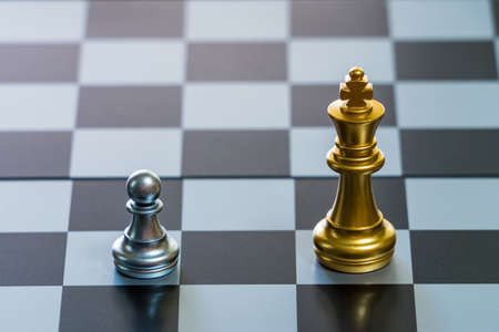 Chess board game,silver chess teame and gold chess team, soft to focus, ideas for business,...