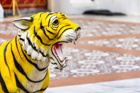 Tiger statue in a temple in Thailandの写真素材
