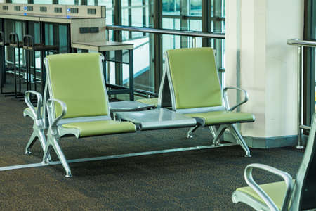 Empty airport. Waiting area in airport. Flight delay cancellation. Travel and vacation concept....
