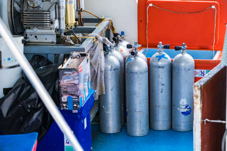 Phuket, Thailand - May, 08, 2022 :  Oxigen tanks for scuba diving on board the boat at Phuket, Thailand.のeditorial素材