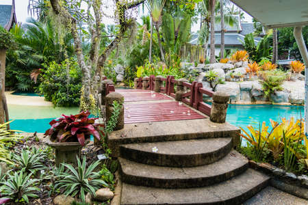 Phuket, Thailand - May, 08, 2022 : Pool bridge of Thavorn Beach Village Resort & Spa at Phuket, Thailand.のeditorial素材
