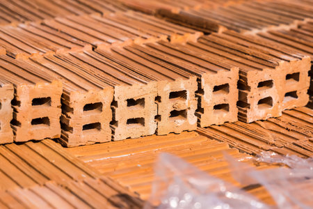 Pile of bricks for construction , group of bricks square construction materialsの写真素材