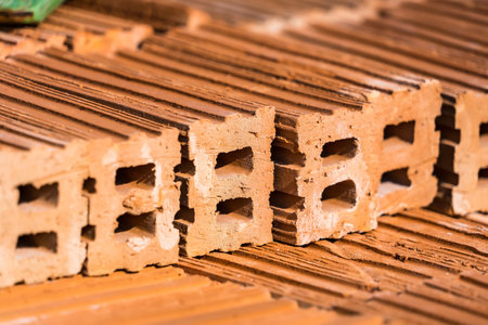 Pile of bricks for construction , group of bricks square construction materials