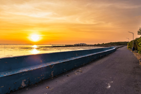 The road along the seashore at sunset.Thailand.