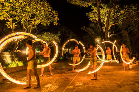 Bangkok, Thailand - October, 15, 2022 : Unidentified name Actors perform fire swinging at dusk in a restaurant on Koh Samet in Thailand.のeditorial素材