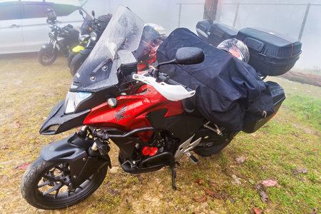Chiang Mai, Thailand - December, 18, 2022 : Big bikes of tourists on Doi Ang Khang on a foggy day at Chiang Mai, Thailandのeditorial素材