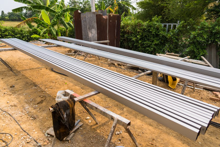 Pile of many different sizes of building material galvanised steelの写真素材