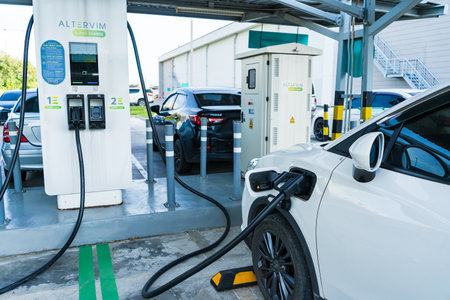 Bangkok, Thailand - January,10, 2024:Electric car charging station. Power supply for electric car charging. Clean energy conceptの写真素材