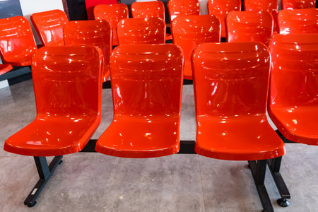 Red chairs for customers to wait in the restaurantの写真素材