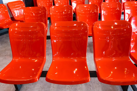 Red chairs for customers to wait in the restaurantの写真素材