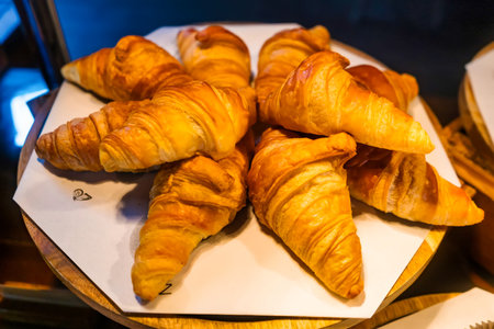 Artisan croissants with flaky layers, a delightful pastry for breakfast lovers.の写真素材