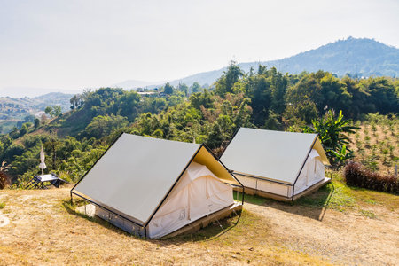 Phetchabun, Thailand - January, 06, 2025 : Modern Outdoor Glamping Tent Surrounded by Nature in a Picturesque Mountain Area at Phetchabun, Thailand.の写真素材