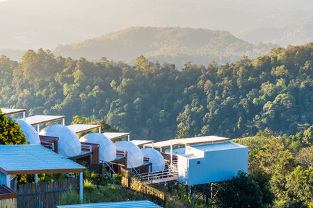 Chiang Mai, Thailand - January, 06, 2026 :Scenic Dome Structures: capturing the essence of luxury accommodation nestled atop a majestic hillside with breathtaking landscape at Chiang Mai Thailand.の写真素材