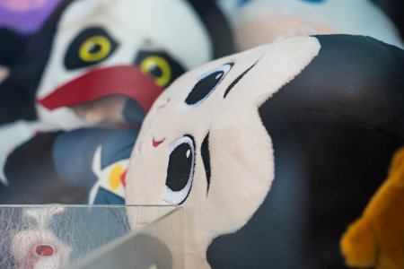 Chiang Mai, Thailand - January,08, 2026:Claw Machine Carnival of Plushies: A vibrant collection of plush toys jostles for attention within a claw machine, a playful scene of prizes vying for a lucky grab.の写真素材