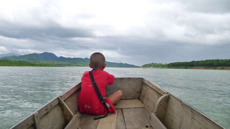 A child on the a boatの写真素材