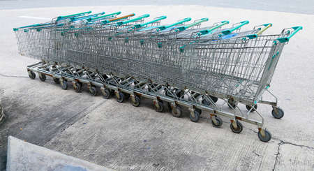A row of parked shopping carts,Thailandの写真素材