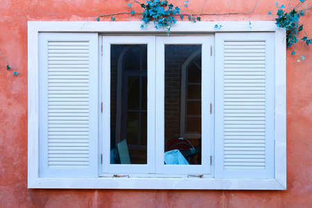 wooden window with concrete wall,Thailand