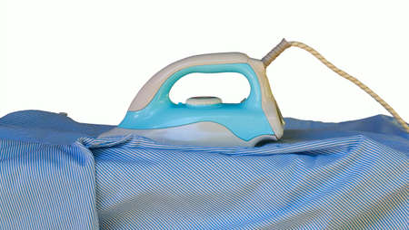 Closeup of  ironing clothes on ironing board,isolatedの写真素材