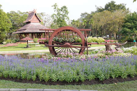 A Thai cart with The Thai Pavilion in the Garden for  Landscape Used or background Used , at King Rama IX Public  Park, Bangkok,Thailandの写真素材