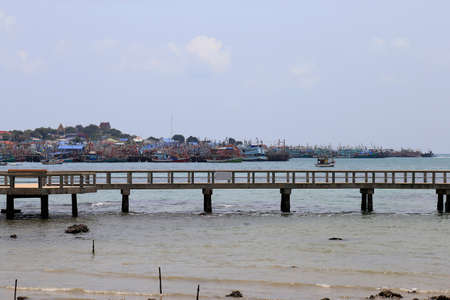 View of the fishing boats from the  Khao Ma Cho  beach, in Sattahip District,  Chon Buri Province, Thailand.の写真素材