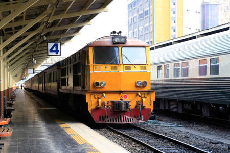 Train stopping on the Railways at  Bangkok Railway Station, Bangkok, Thailand.の写真素材