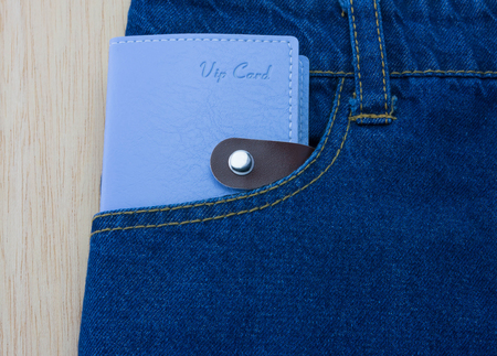 Blue jeans detail with blank badgeの写真素材