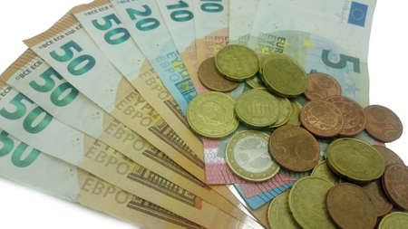 various euro bills and small change in close-upの写真素材