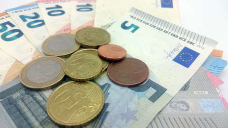 Euro bills with small change in close-upの写真素材