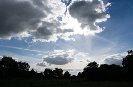 beautiful evening cloud sky with back light. Location: Germany, North Rhine - Westphalia, Borkenの写真素材