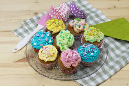 colorful, homemade cupcakes on a platterの写真素材