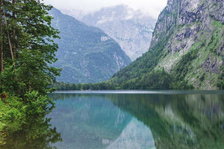 Great summer panorama of the Obersee lake. Green morning scene of Swiss Alps, Nafels village location, Switzerland, Europe. Beauty of nature concept backgroundの写真素材