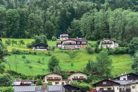 Summer view of houses, hotels and restaurants in the mountains, in the Alps, Berchstengadenの写真素材