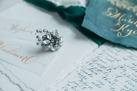 Wedding floristics and details. Wedding invitations. Orchid. Boutonniere for the groom. Wedding rings. Butterflyの写真素材