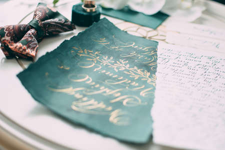 Wedding floristics and details. Wedding invitations. Orchid. Boutonniere for the groom. Wedding rings. Butterflyの写真素材