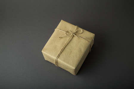 Gift box on a dark background. Top view with place for textの写真素材