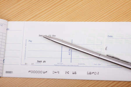 Check book and penの写真素材