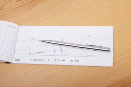 Check book and penの写真素材