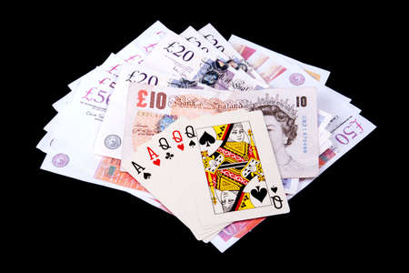 Playing cards and money in casino.のeditorial素材