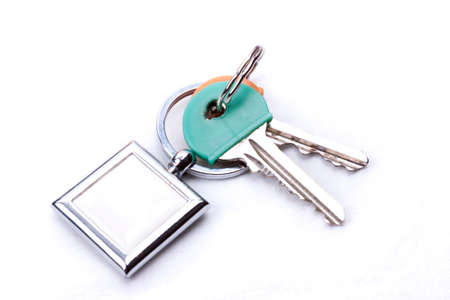 A bunch of keys with a key ring, isolated on a white background 