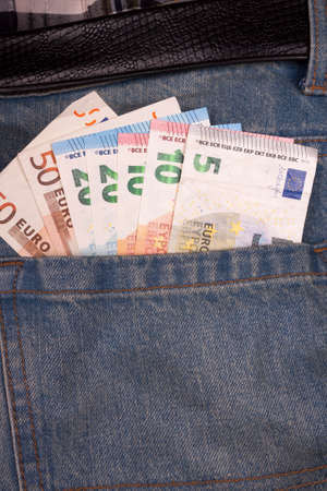 photo of Euros in a jeans pocketの写真素材