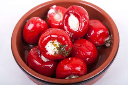 sweet red peppers stuffed with soft cream cheeseの写真素材