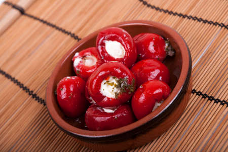 sweet red peppers stuffed with soft cream cheeseの写真素材