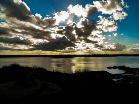 sunshine under clouds