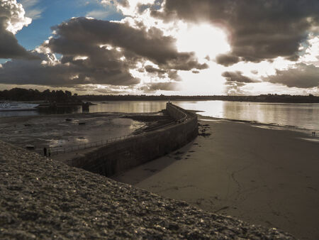 the sun breaks through the cloudsのeditorial素材