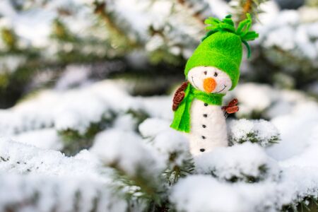 Winter, Christmas - Happy, smiling snowman on snow (copy space)の写真素材