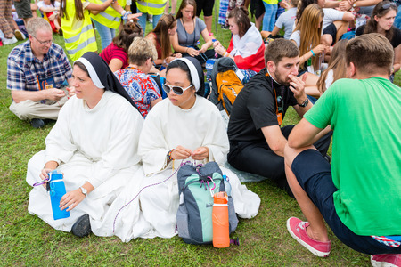 Poznan, POLAND - JULY 24, 2016: pilgrims praying, dancing and singing during Days In Dioceses just before The World Youth Day in Krakow; WYD is a meeting of youth from all over the worldのeditorial素材