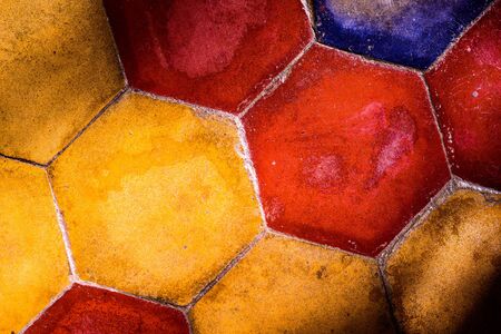 The background image of old colorful hexagonal clay tilesの写真素材