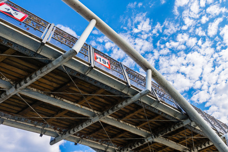 Under the bridge - steel-wooden bridge construction seen from below