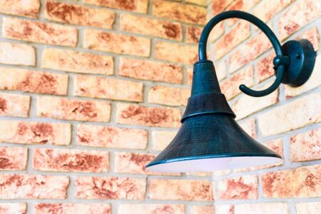 Retro wall lamp - vintage sconce - on the brick wall